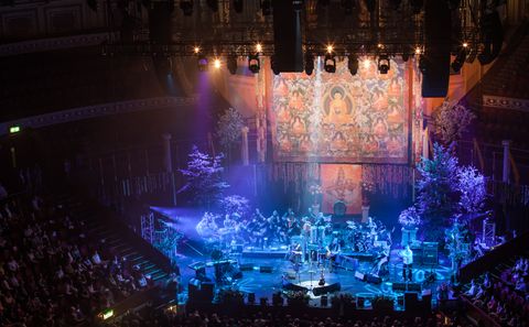 The Royal Albert Hall stage, dressed with trees and a thangka backdrop